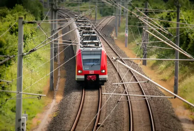 China-Europe Railway Express freight train crossing rail bridge to Europe